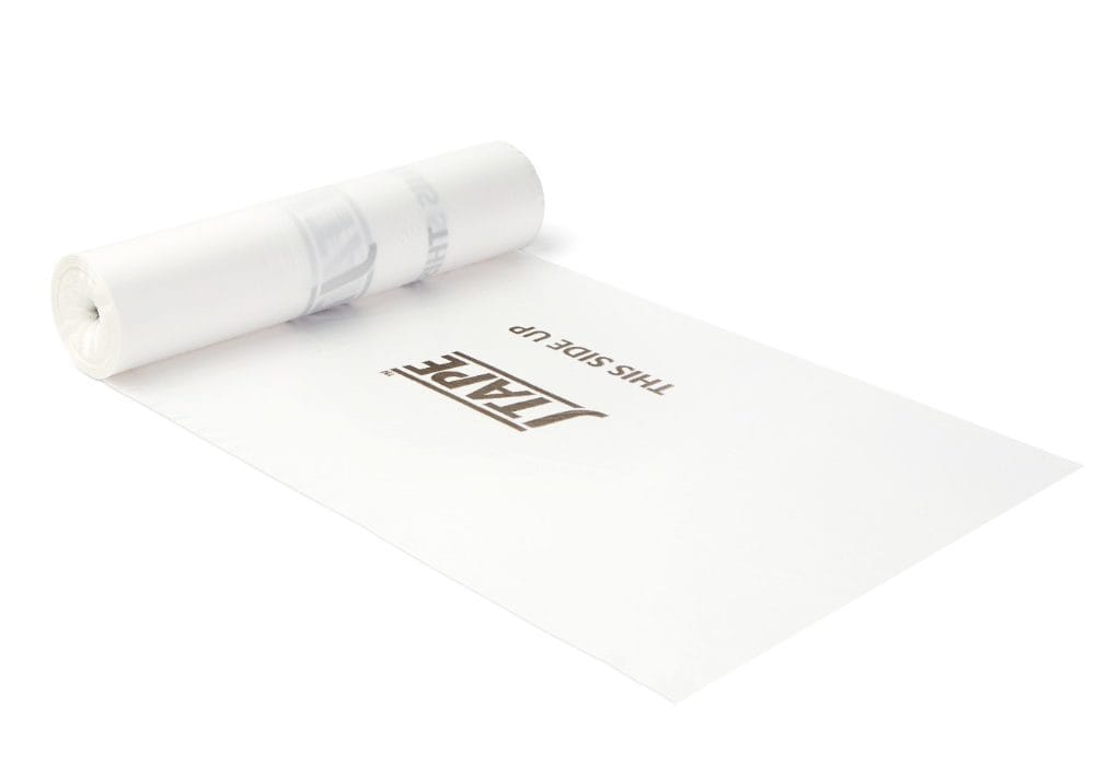 A rolled white tube of masking film lies beside a flat sheet with "JTAPE" boldly printed.