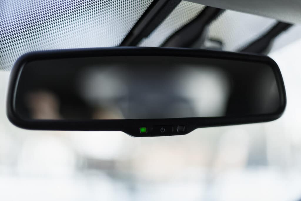 close up image of a car rearview mirror